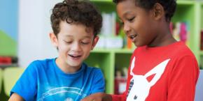 Photo of children reading together