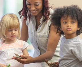 Woman and two young children