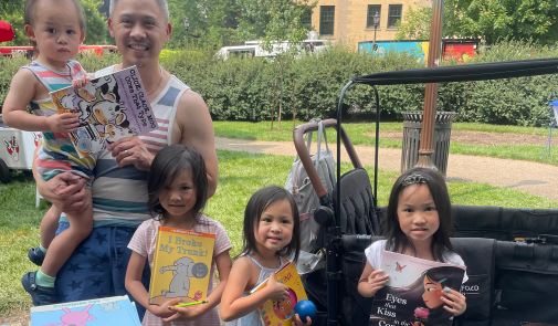 Photo of Ohio family with books at ROTW event