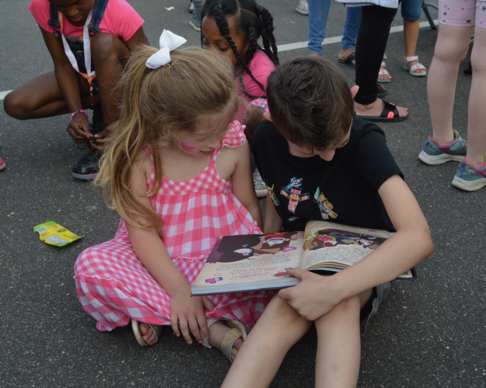 Photo of children reading together at a ROTW event in Sachem, NY